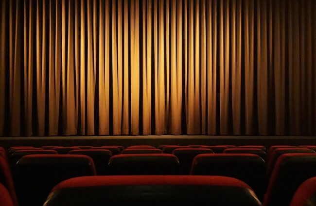 movie-theater-g5f37f115f_1280